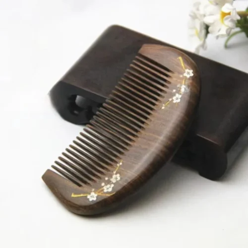 S408c3e30f8b144b0ac5437d3af500462w.webp Peigne à cheveux en bois de santal doré