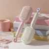 Nouveau peigne à coussin d'air extensible
