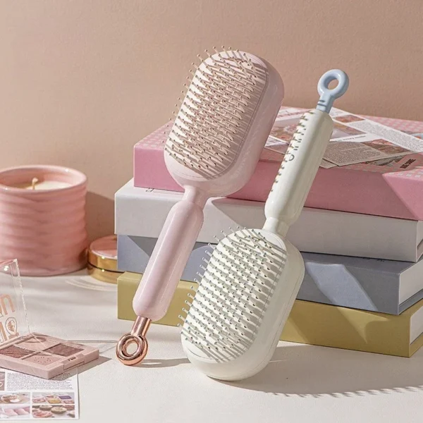Nouveau peigne à coussin d'air extensible