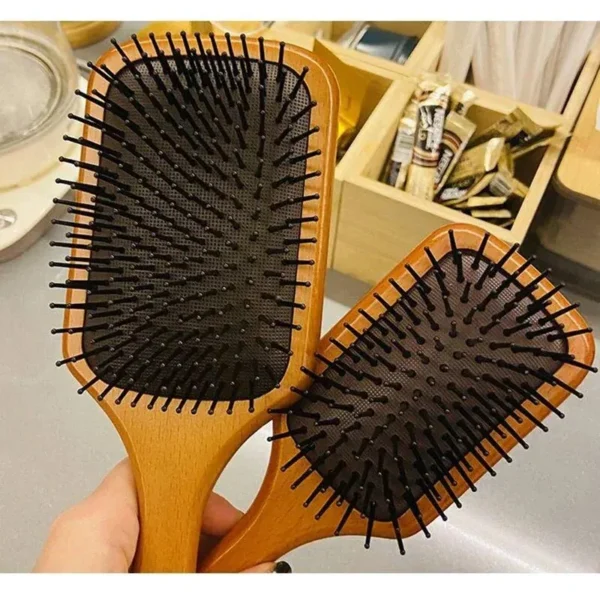 Brosse coussin d'air pour le soin du cuir chevelu