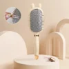 Brosse à coussin d'air pour prévenir la chute des cheveux