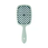 Brosse plastique de massage du cuir