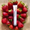 S7959a1a5b96f4132a58e41f067acf31cq.webp Gloss à lèvres Spicy Marg Juice Box natuel
