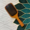 Brosse coussin d'air pour le soin du cuir chevelu