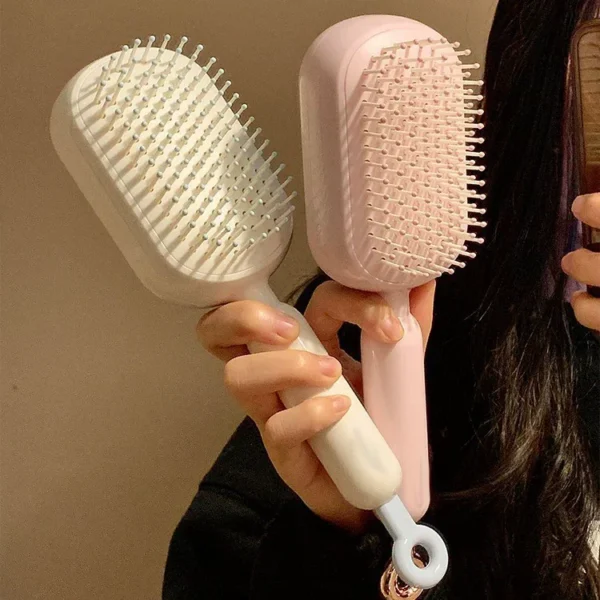 Nouveau peigne à coussin d'air extensible