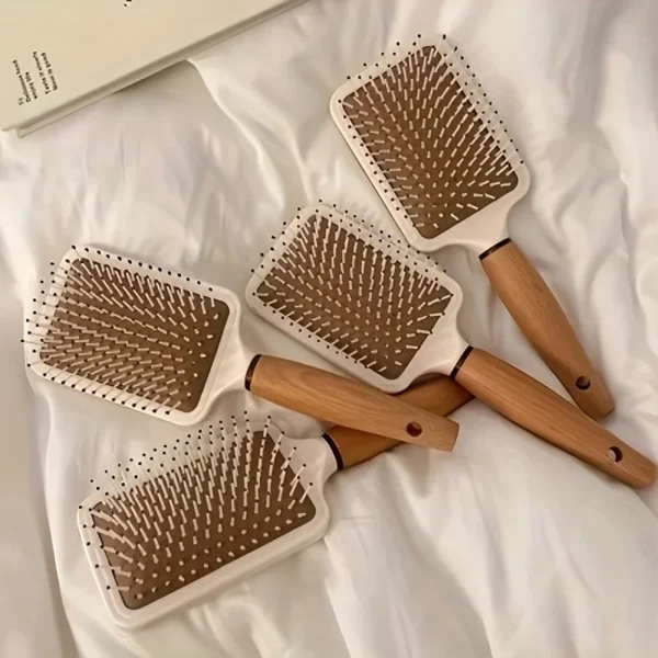 Peigne de massage à coussin d'air