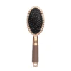Brosse démêlante à airbag pour le cuir chevelu