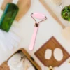 Rouleau de massage facial en quartz rose
