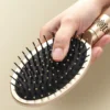 Brosse à cheveux massante à coussin d'air