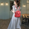 Sac à dos rouge en simili cuir avec grain femme
