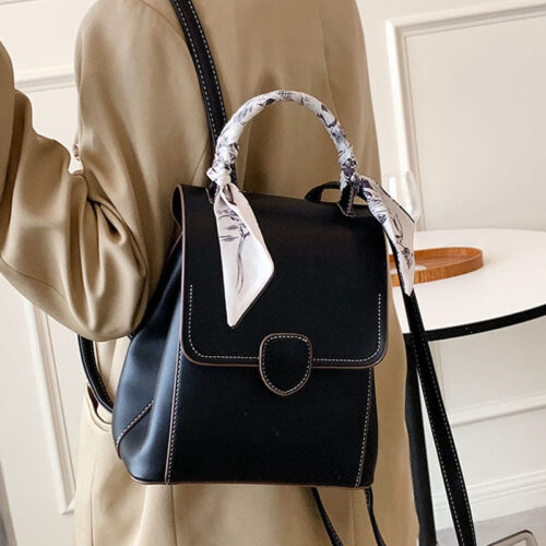 H836c2c19d91b46f1973bafda3147526bv_0fc7ca29-e0d7-4800-8b79-f9c79b8881bajpg Sac à dos femme simili cuir noir avec poignée en tissu