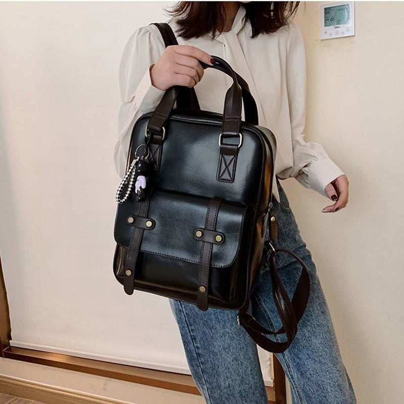 Sac à dos simili cuir noir étudiant aspect sacoche